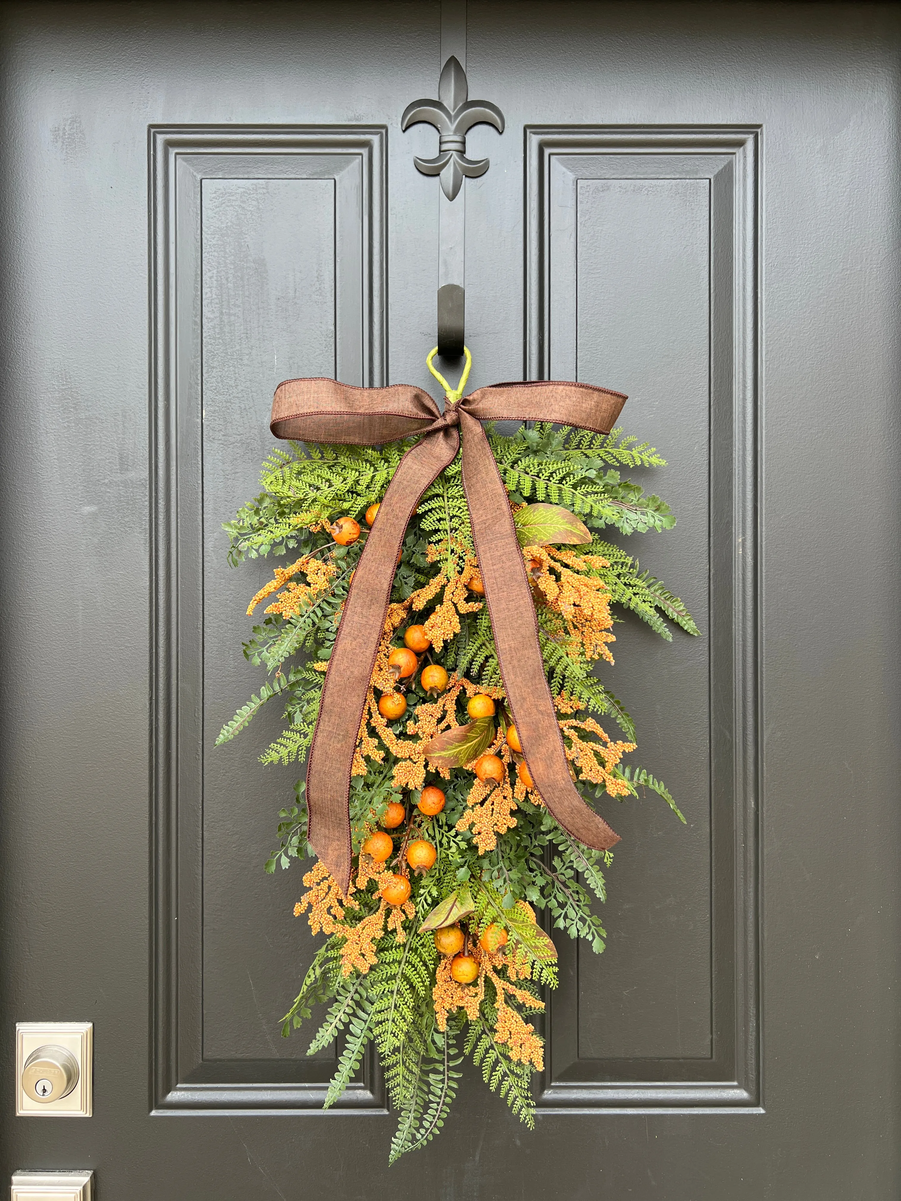 Cozy Fern Swag with Orange Fall Berry Clusters