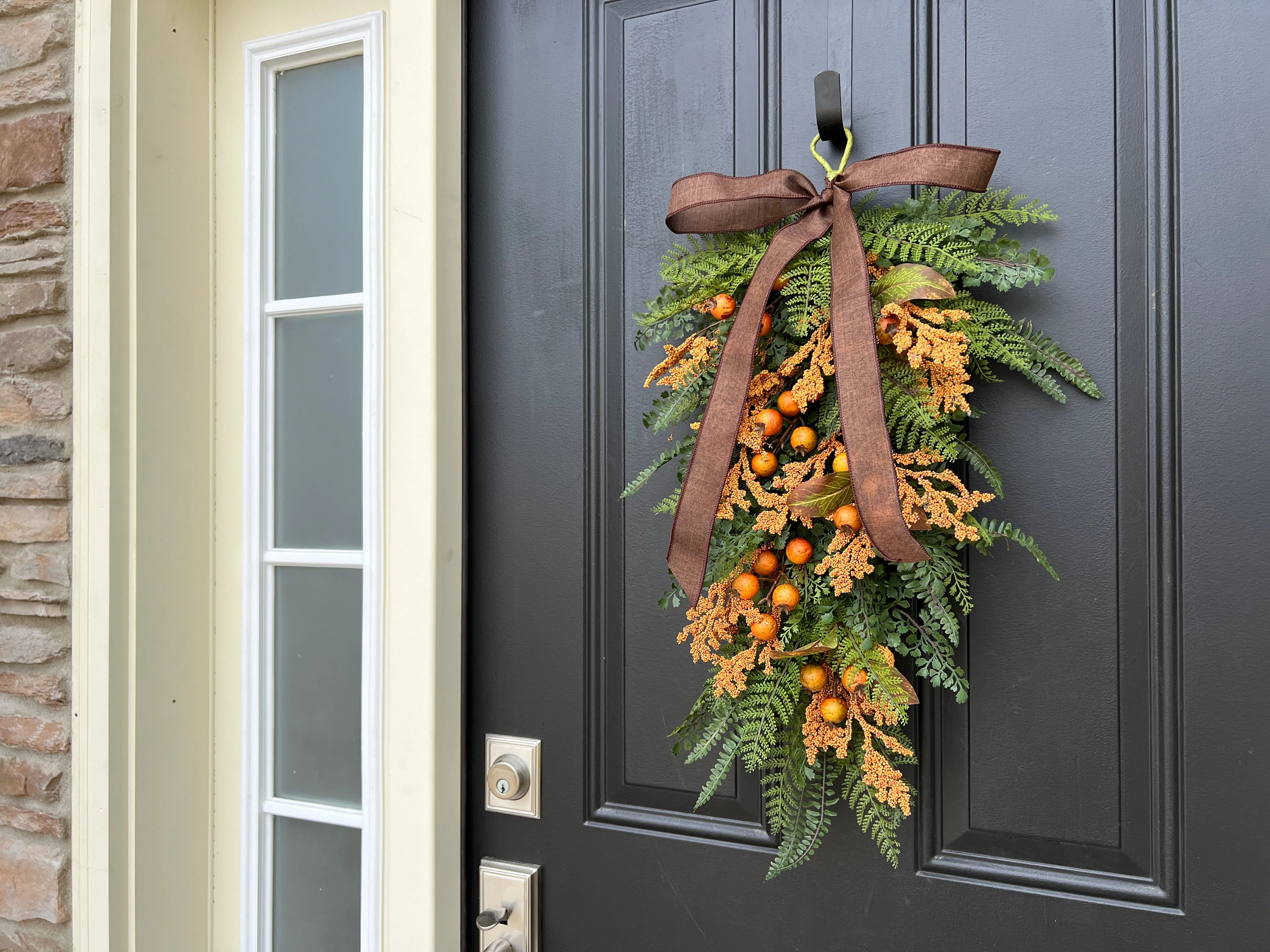 Cozy Fern Swag with Orange Fall Berry Clusters